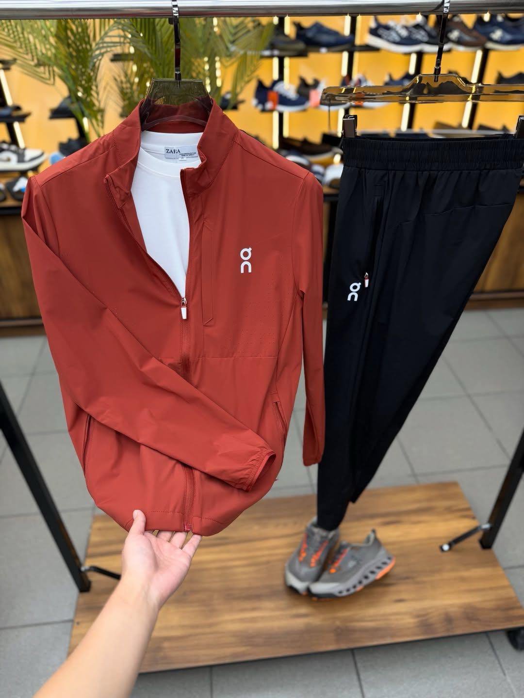 On Rust Red Jacket and Black Pants Set