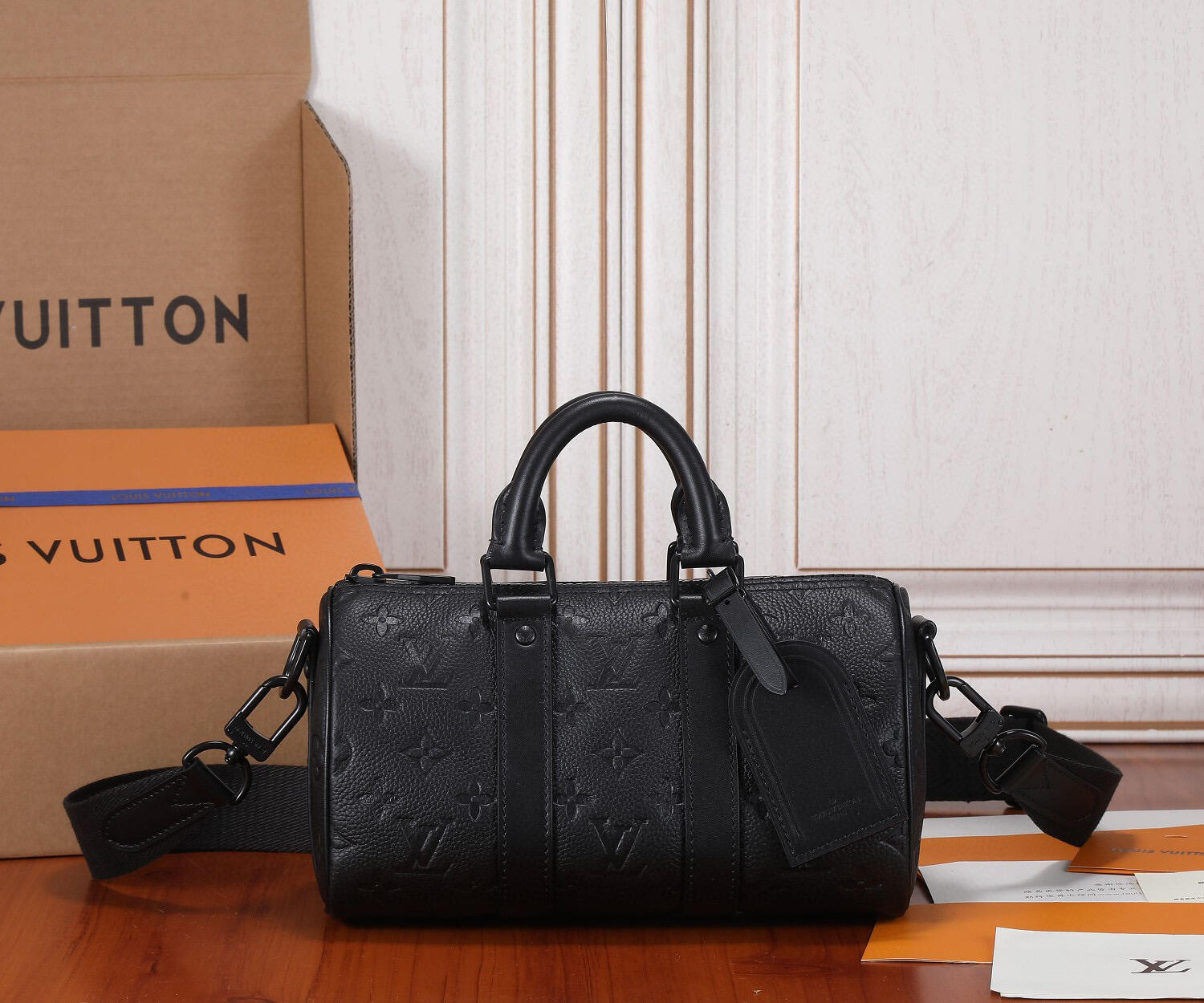 Louis Vuitton Embossed Monogram Barrel Handbag