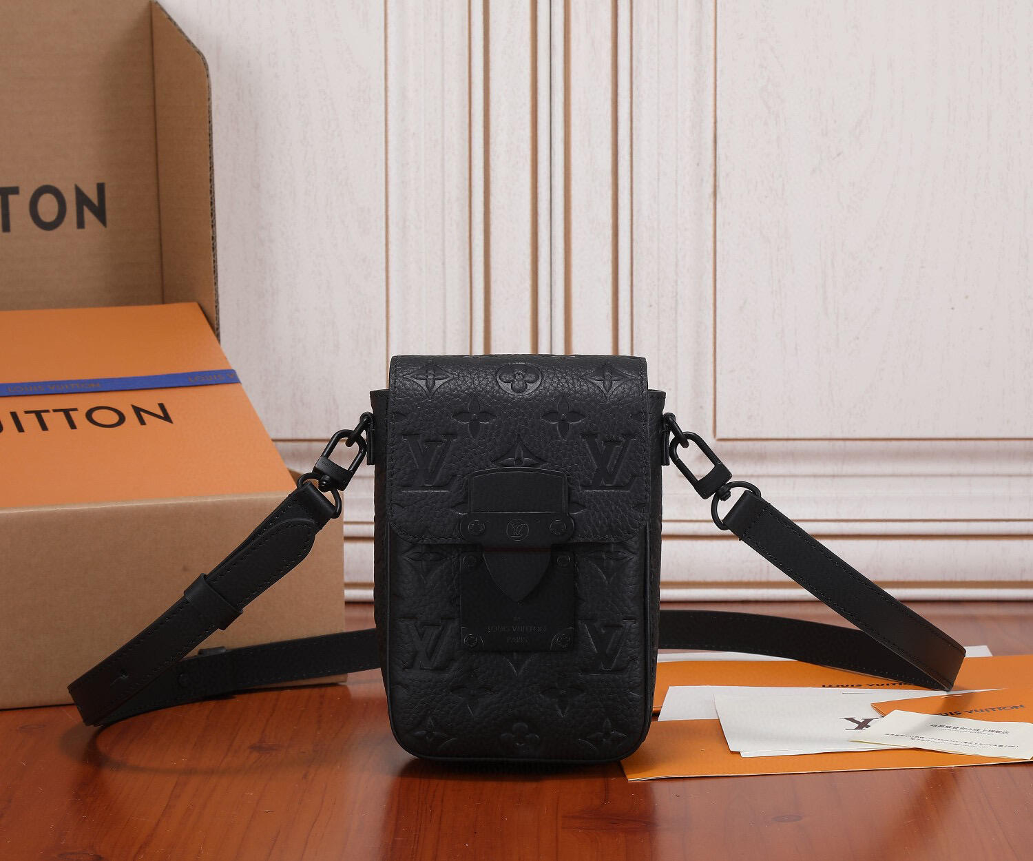 Louis Vuitton Embossed Monogram Phone Crossbody Bag