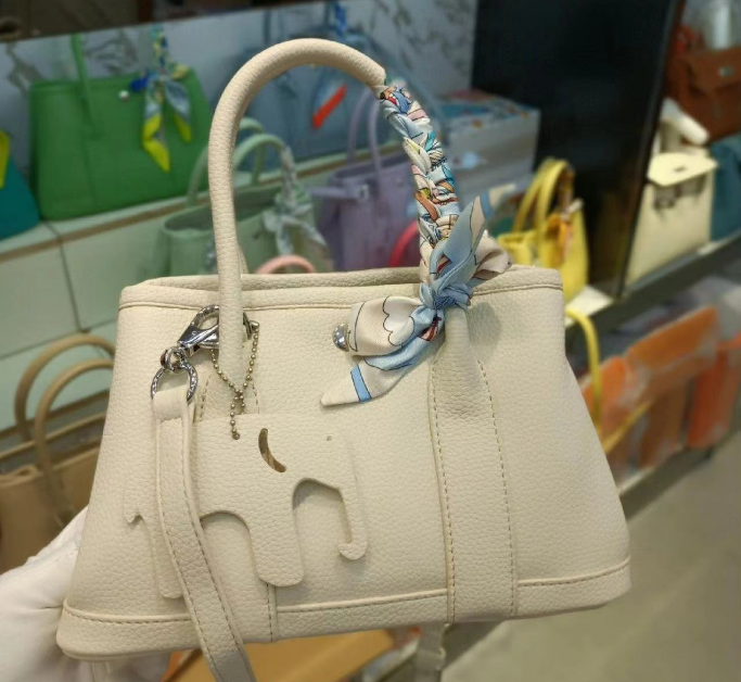 Ivory Textured Top-Handle Handbag