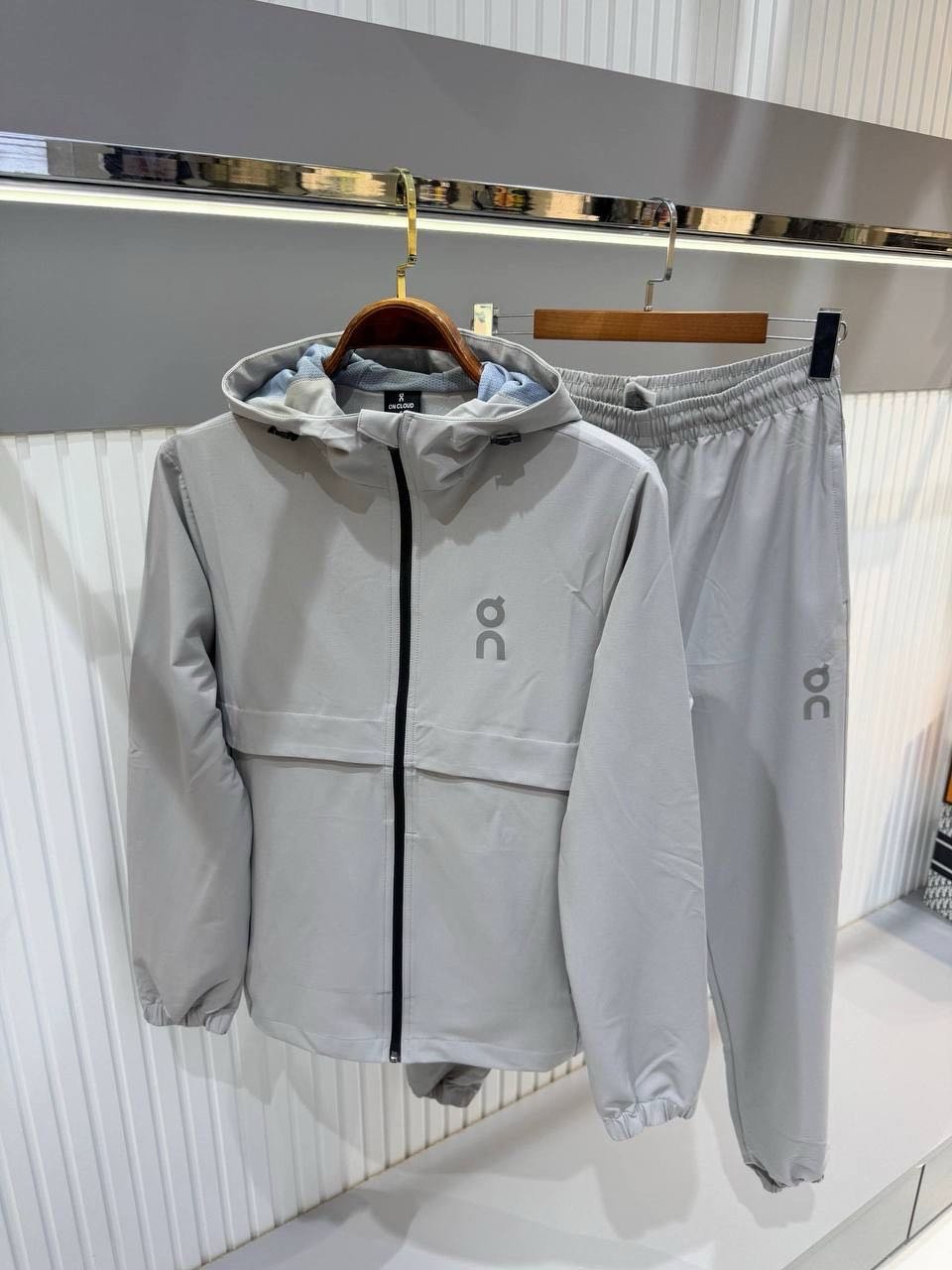 On Light Gray Hooded Jacket and Pants Set