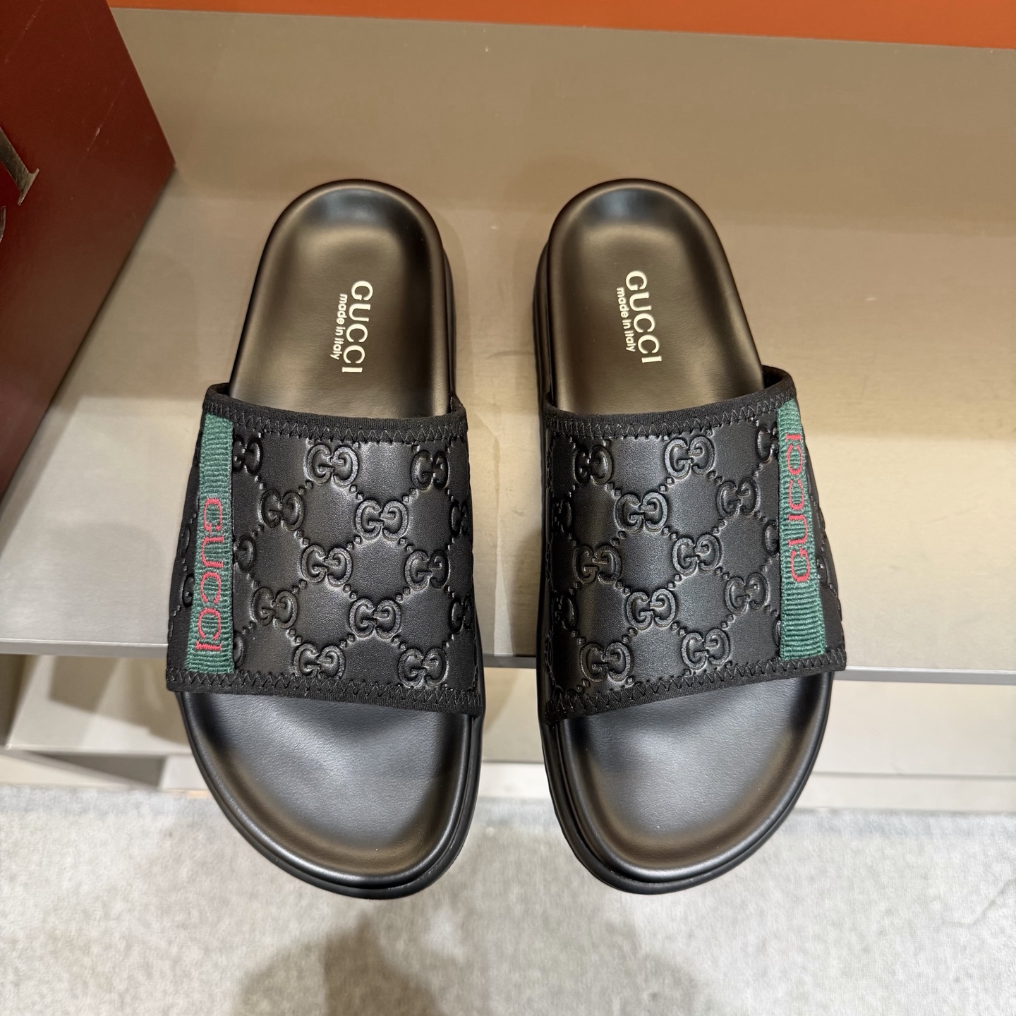 Gucci GG Embossed Slide Sandals