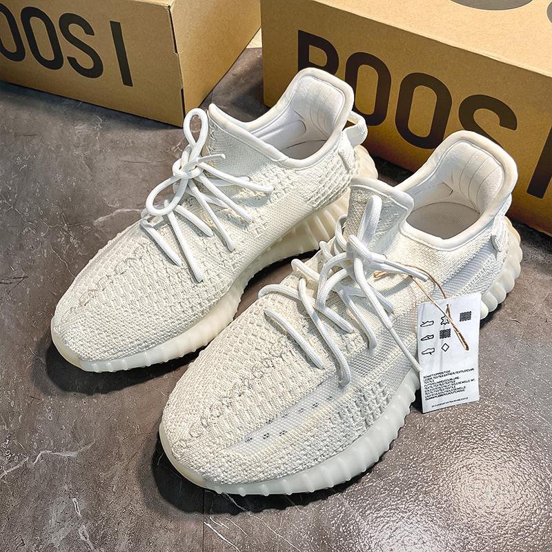 Triple White Knit Sneakers